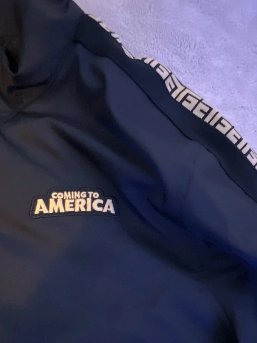Nike Black Windbreaker Jacket with Gold Sleeve Tape